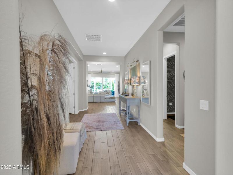 Expansive Front Entry with Wood Like Por