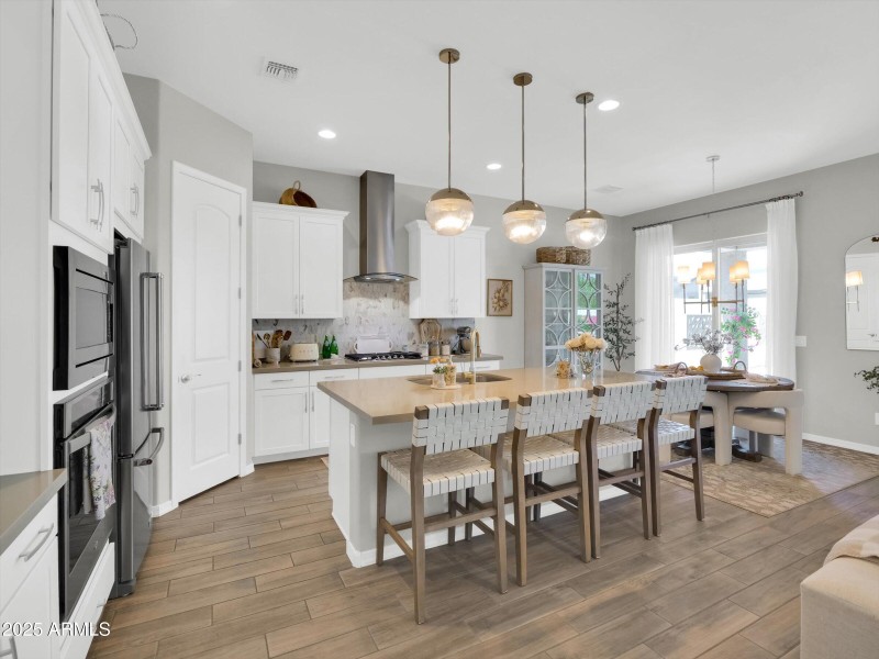 Chef's Kitchen with Wall Oven Gas Cookto