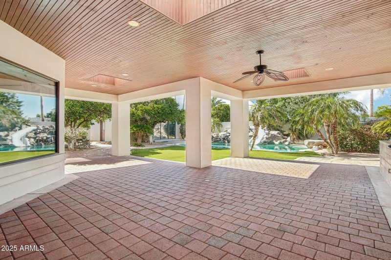 large patio with several seating areas