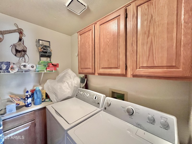 Laundry rm with cabinets