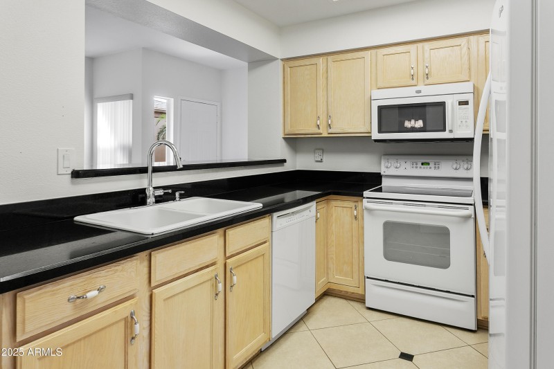 Kitchen opens to Living Room