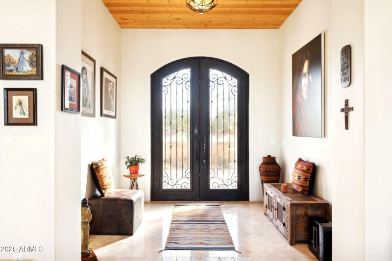Entry w/ double iron doors