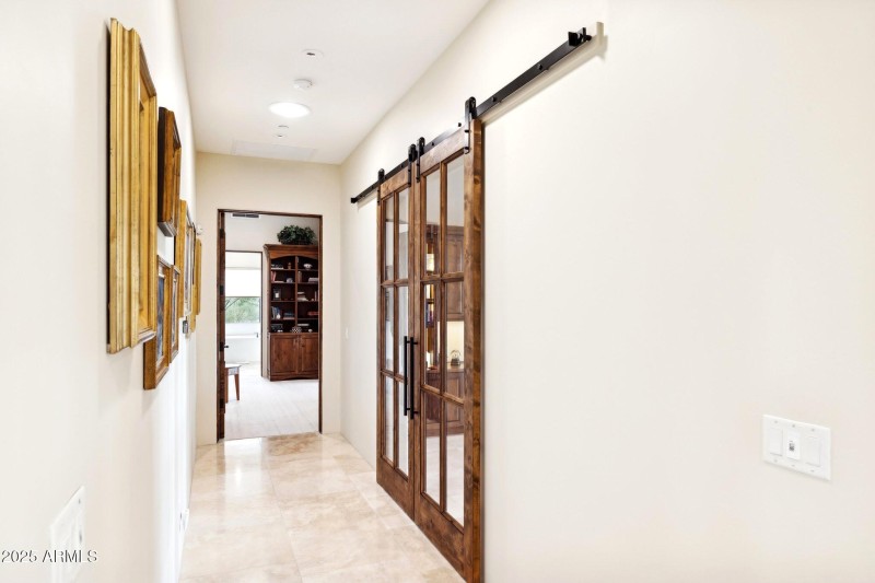 Long hallway to primary suite