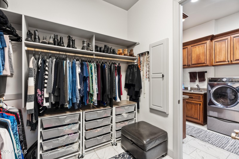 30-Primary Closet to Laundry Room