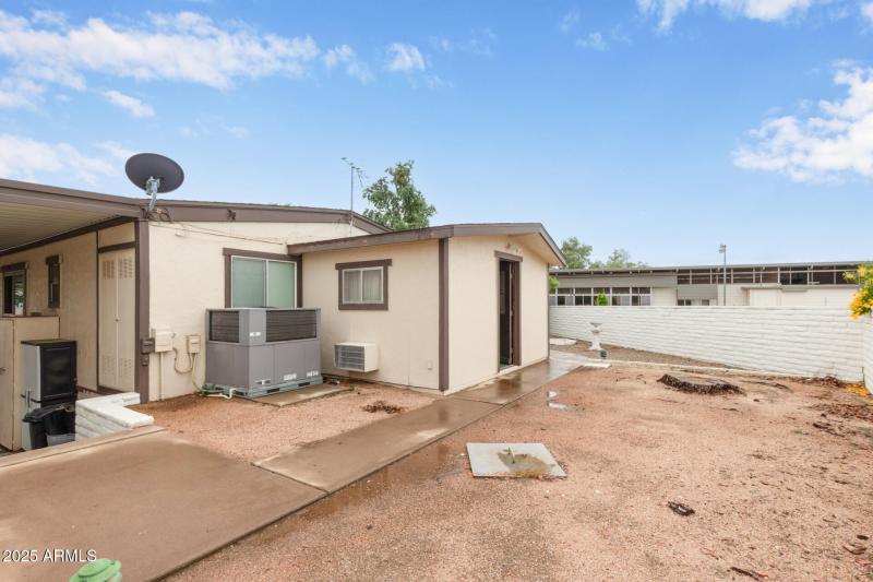 Backyard and attached shed with AC