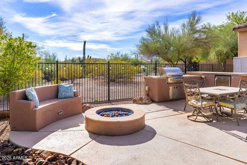 Outdoor Built in Firepit Seating and BBQ