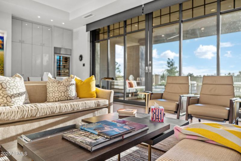 Great Room seating shot to Bar & Patio.