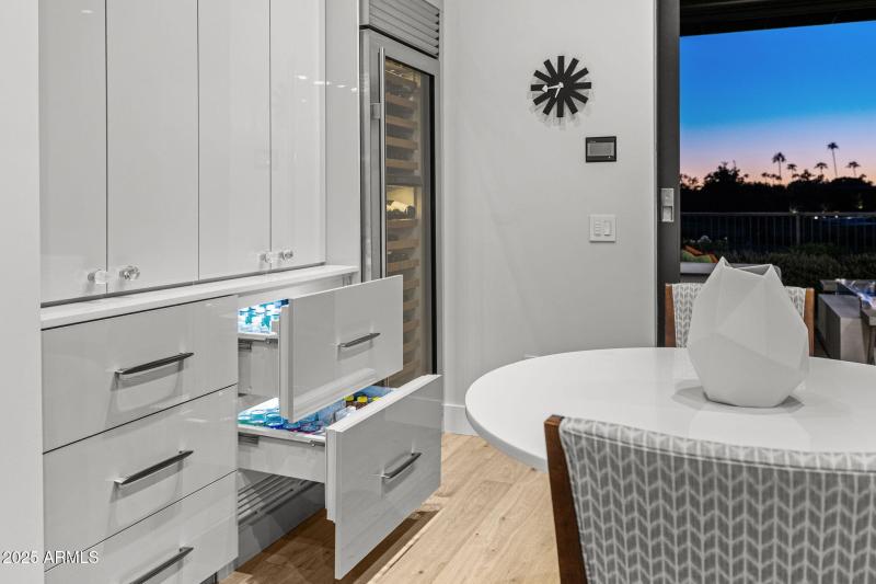 Bar with refrigerated beverage drawers.