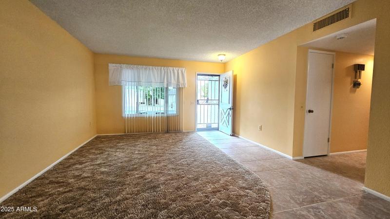Living Room to Hallway off 3 Bedrooms