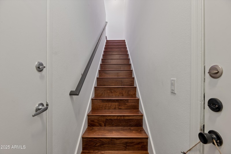 Stairway from garge and main entry foyer