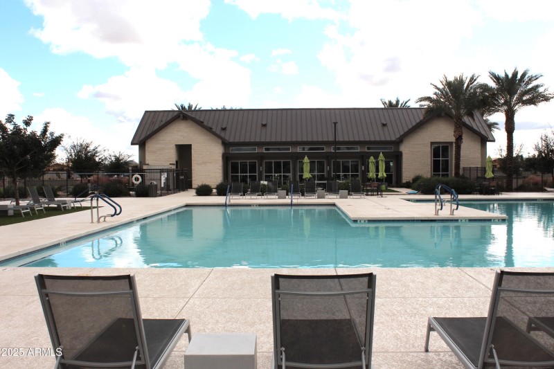 Lawn chairs and pool