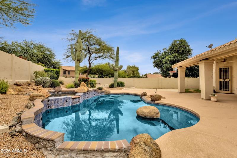 Serene Backyard with Sparkling Pool