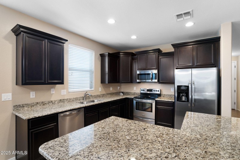 Kitchen with SS Appliances