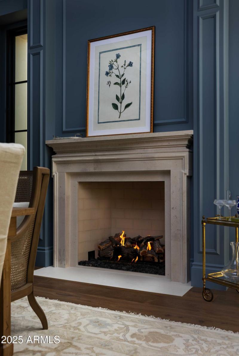 Limestone fireplace in dining room