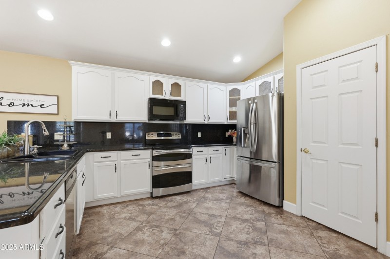 white cabinetry with hardware