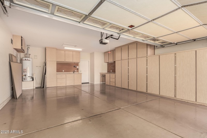 Garage with Cabinets and Work bench!