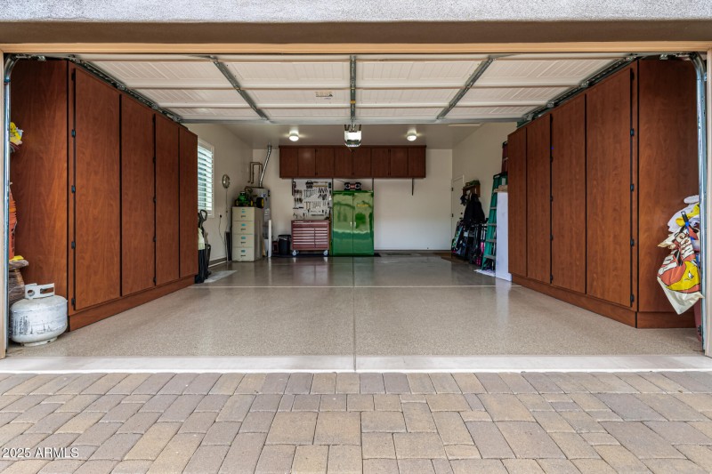 2 Car Garage with Built-In Cabinets