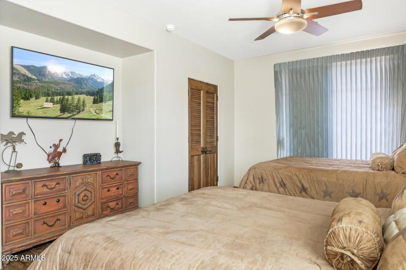 Junior suite bedroom with patio access