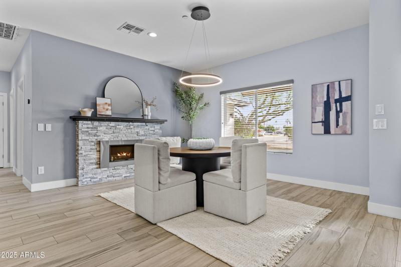 Dining with cozy fireplace