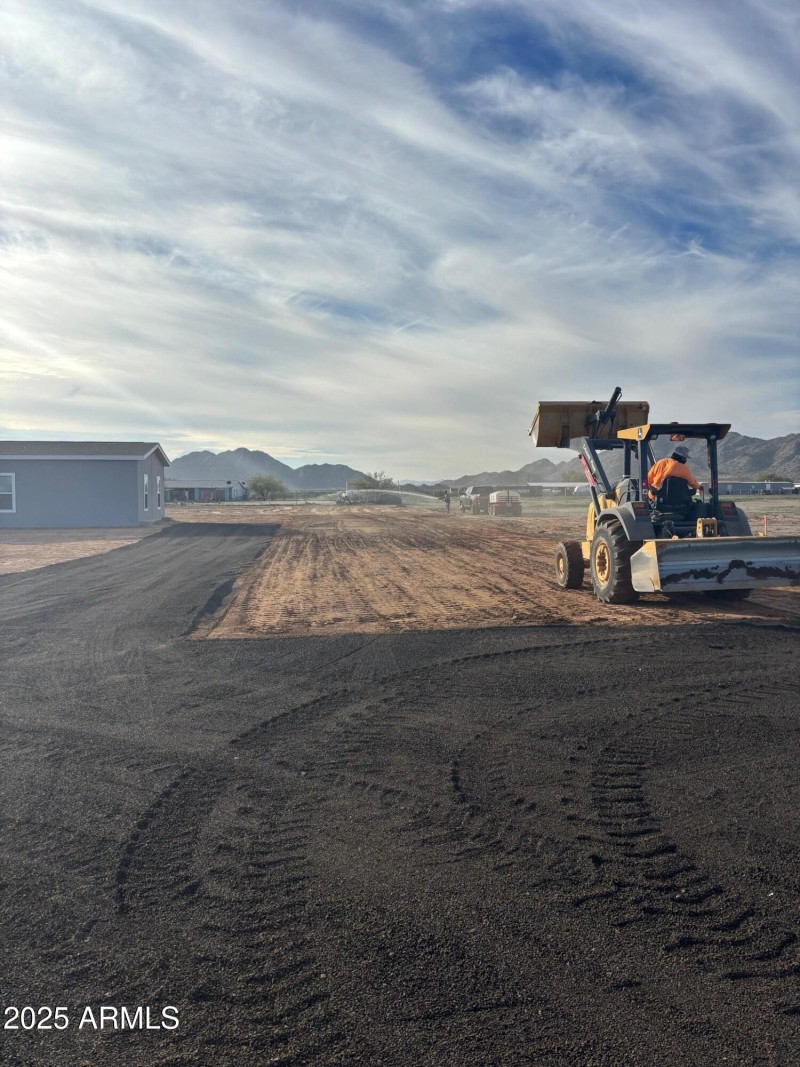 Driveway and grade the land