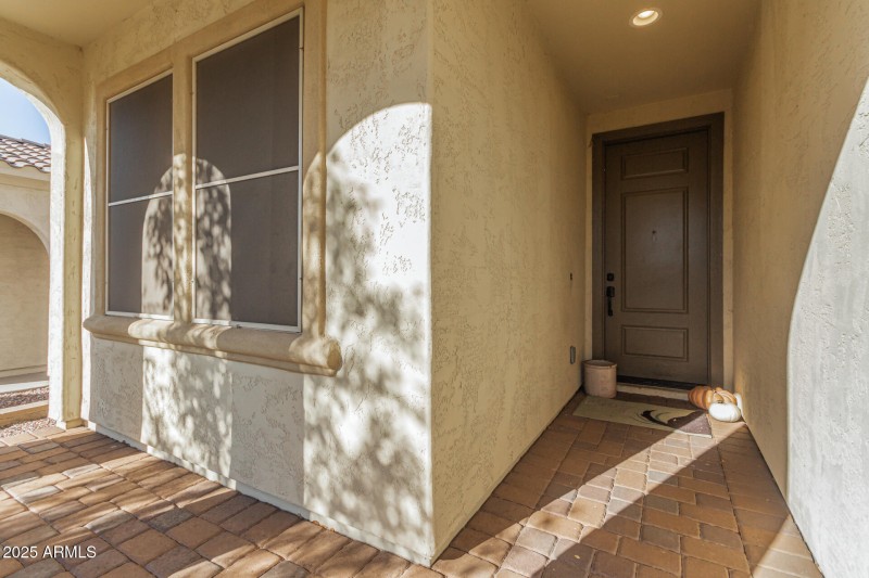 WELCOMING COBBLESTONE FRONT PORCH ENTRAN