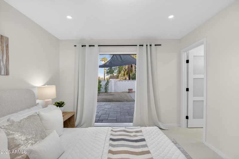 PRIMARY BEDROOM WITH ACCESS TO OUTSIDE