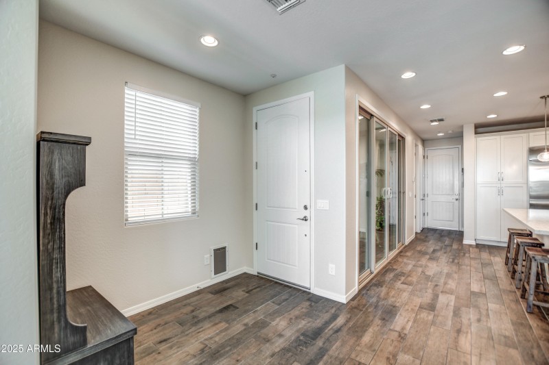 Garage Entry & Stairs Behind Kitchen