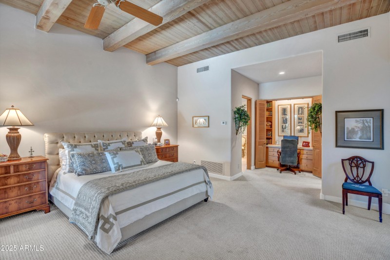 Master bedroom with hidden writing desk