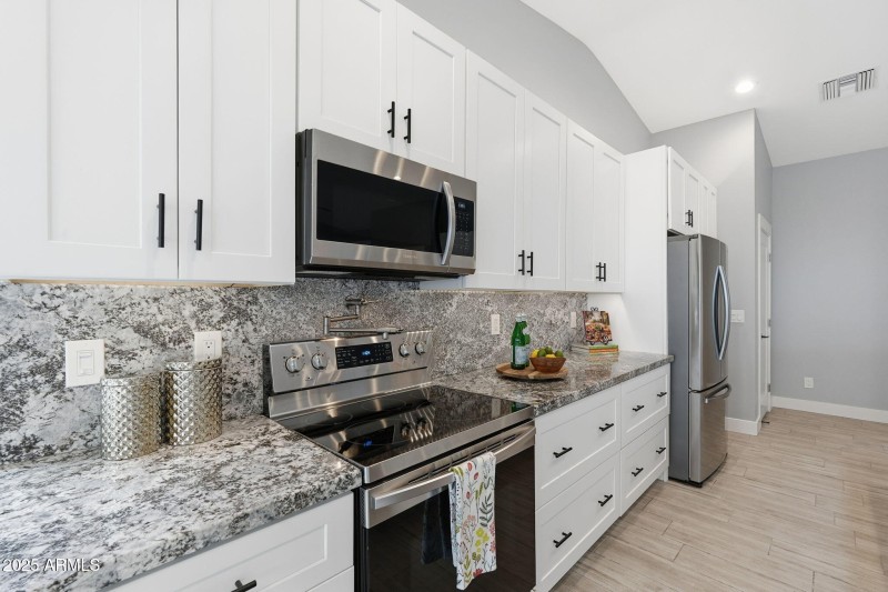 Pot filler over range