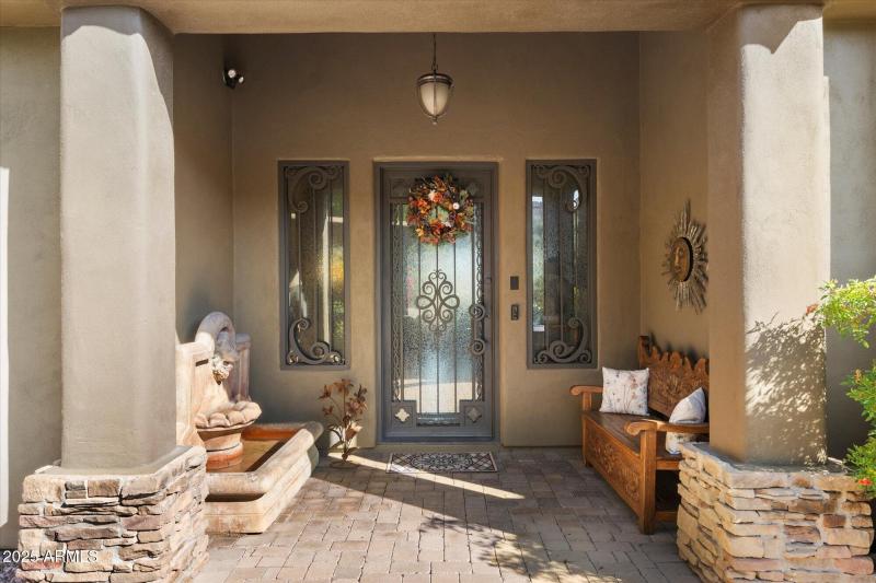 Welcoming Entry w/ Custom Iron Door