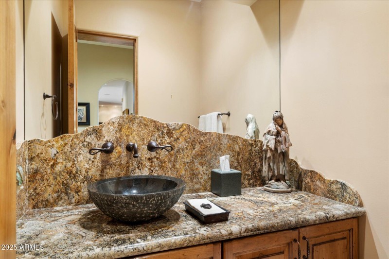 Powder Room with Chiseled Granite