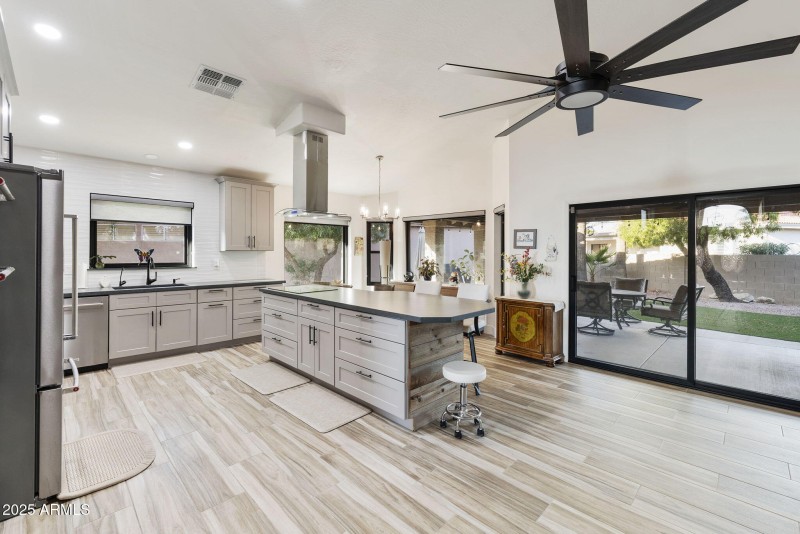 Kitchen with island and patio access