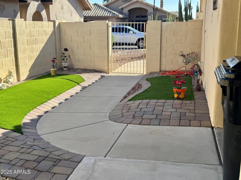 Side Yard with turf and pavers