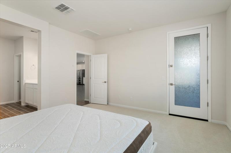 Primary Bedroom with Exit Door