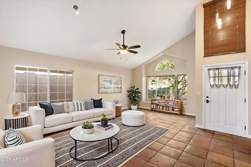 Ample Light & Vaulted Ceiling Upon Entry