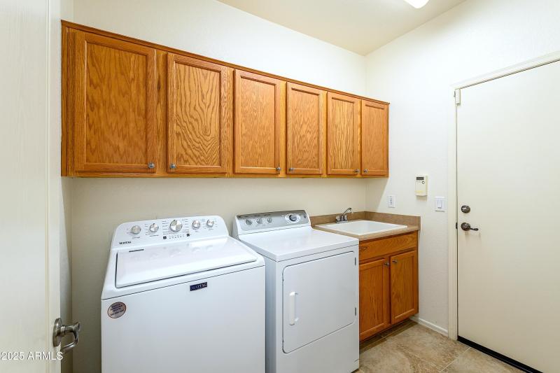 Laundry w/sink Exit to Garage
