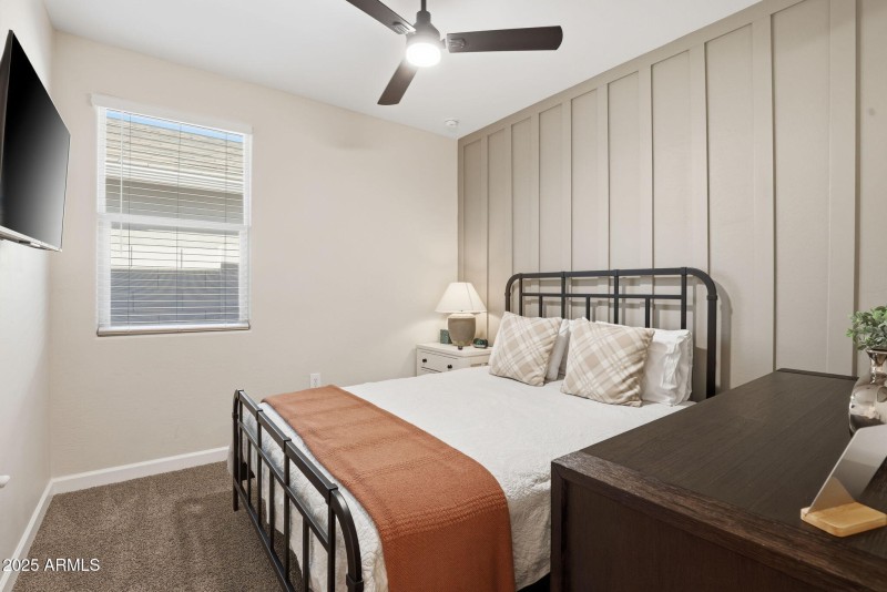 Two tone room with custom paneling on wa