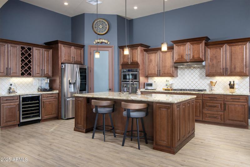 Huge kitchen with wine fridge and pantry