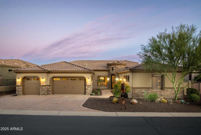 Front with paver driveway