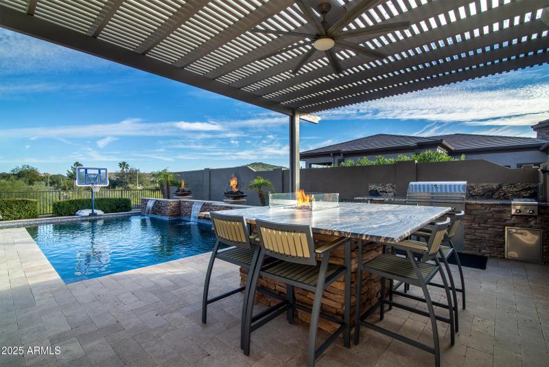 Outdoor kitchen with pool