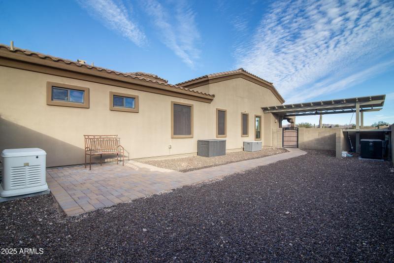 South side yard with pool equipment
