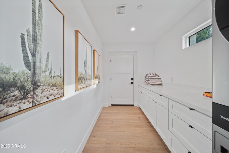 Large laundy room with extra storage