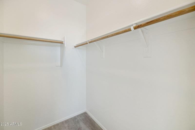 FRONT BEDROOM WALK IN CLOSET