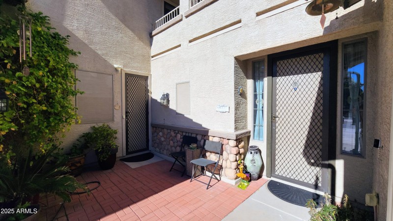 Inviting Courtyard with main house inter
