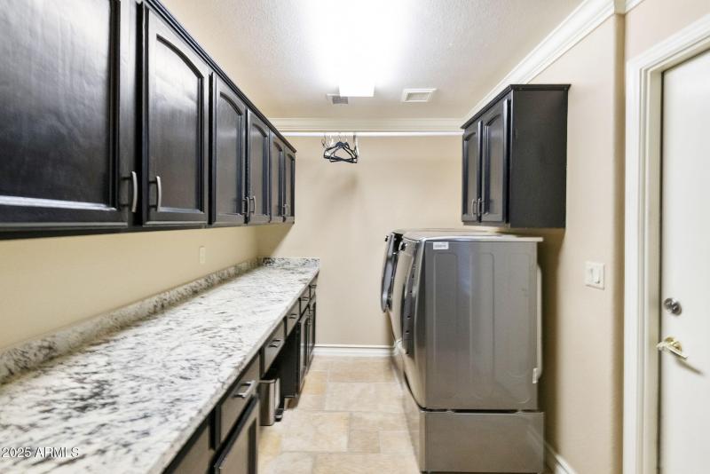 Laundry with cabinets