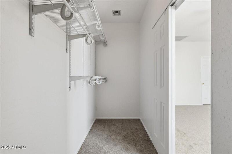 Primary walk-in closet