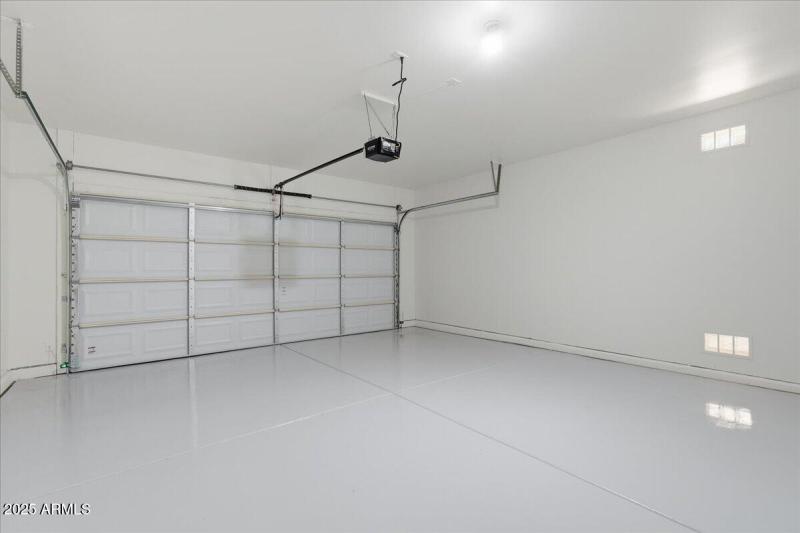 New garage door and epoxy flooring