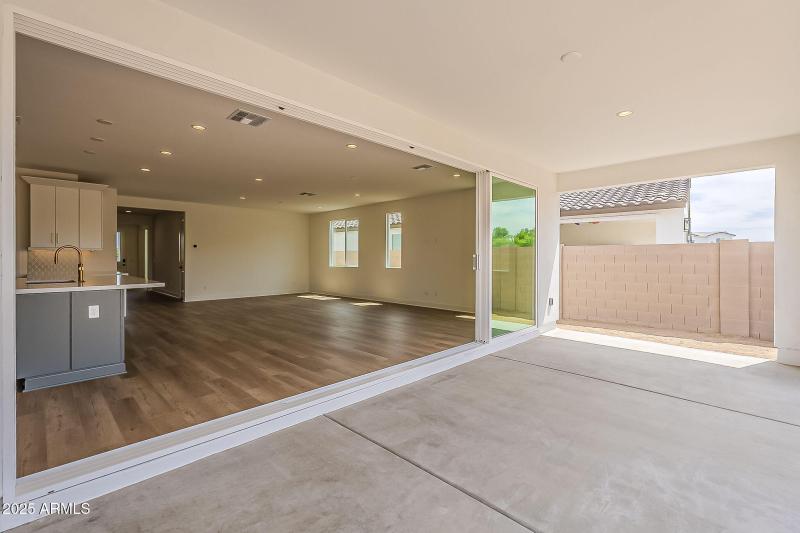 Sliding Glass Door To The Patio