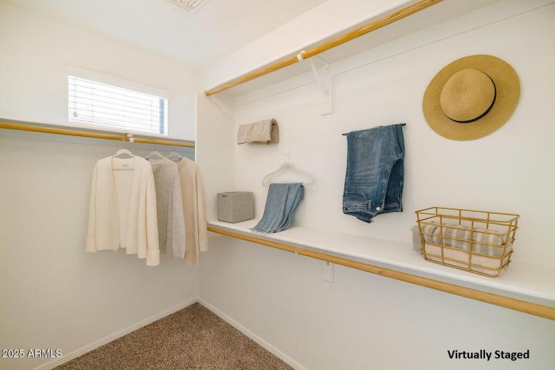 Primary closet - virtually staged