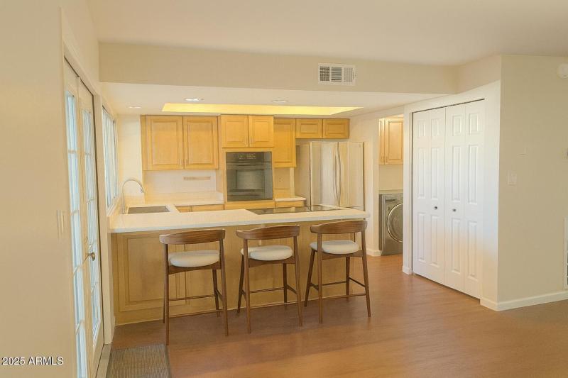 Kitchen with Virtually Staged Barstools